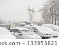 Vehicles Buried In Snow With Transmission Tower In Background 133953821