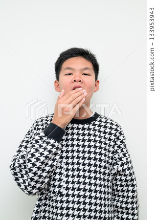 Asian Teenage Boy Studio Portrait on White Background Tired Yawning Asian Teenage Boy Studio Portrait on White Background Tired Yawning 133953943