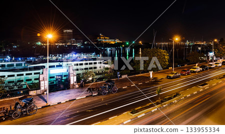 Night landscape of the river Nile and the town of Aswan in Egypt Night landscape of the river Nile and the town of Aswan in Egypt 133955334