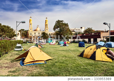 Camping place in front of the Coptic Cathedral in Khartoum, Sudan. Camping place in front of the Coptic Cathedral in Khartoum, Sudan. 133955369