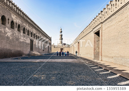Tourists walking around Ahmed Ibn Tulun, mosque in Cairo, Egypt 133955389