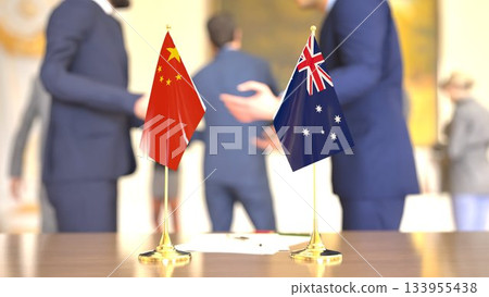 China - Australia diplomatic discussion with desk flags, 3D rendering China - Australia diplomatic discussion with desk flags, 3D rendering 133955438