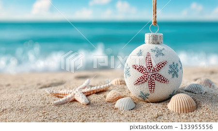 Christmas ornament with starfish on beach Christmas ornament with starfish on beach 133955556