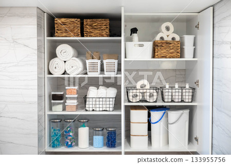 White bathroom laundry comfortable storage organizing arrangement on shelves eco style minimalism White bathroom laundry comfortable storage organizing arrangement on shelves eco style minimalism 133955756