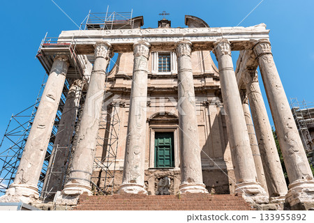 Facade of the temple of Antoninus and Faustinalocated in Roman Forum,, Rome, Italy. 133955892