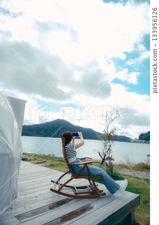 An afternoon unwinding in the gentle breeze An afternoon unwinding in the gentle breeze 133956126