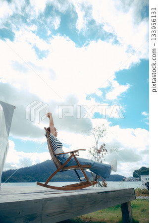 An afternoon unwinding in the gentle breeze 133956131