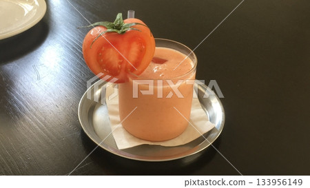 Refreshing tomato slushie with a blend of ripe, juicy tomatoes and ice, offering a perfect balance of natural sweetness, tangy flavor, and icy coolness in every revitalizing sip. Refreshing tomato slushie with a blend of ripe, juicy tomatoes and ice, offering a perfect balance of natural sweetness, tangy flavor, and icy coolness in every revitalizing sip. 133956149