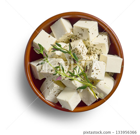 bowl of fresh greek cheese cubes 133956366