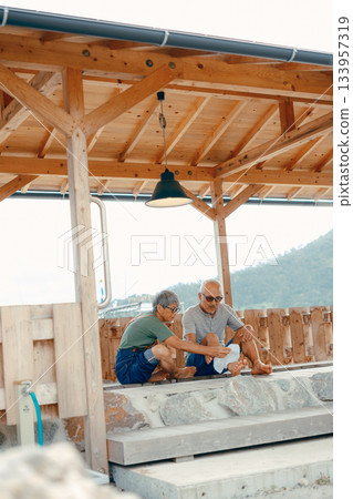 Senior couple enjoying a foot bath 133957319