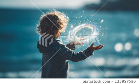 一個孩子手掌上拿著永續發展目標色輪 133957580