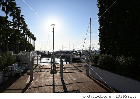 View of the harbor at dusk from the yacht harbor 133958115