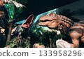 Lifelike animatronic dinosaurs moving in a jungle-themed attraction 133958296