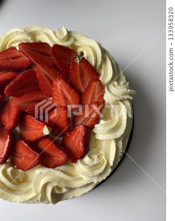A delicious, fluffy cake with layers of rich flavor, perfect for any occasion. Often topped with frosting or fresh fruits, it's a sweet treat that brings joy to every bite. 133958320