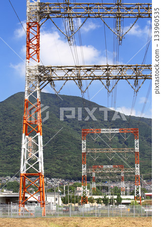 Transmission lines that carry large amounts of electricity from power plants to substations and consumption areas Transmission lines that carry large amounts of electricity from power plants to substations and consumption areas 133960535