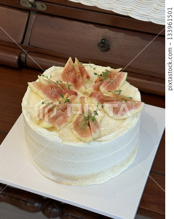 A delicious, fluffy cake with layers of rich flavor, perfect for any occasion. Often topped with frosting or fresh fruits, it's a sweet treat that brings joy to every bite. 133961501