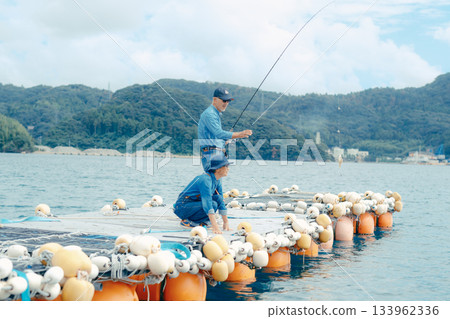 Senior couple enjoys fishing after catching a fish 133962336
