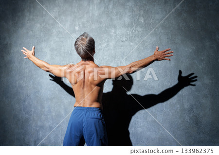 Senior man doing muscle training Senior man doing muscle training 133962375