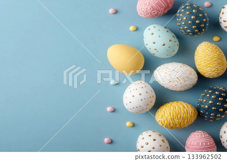 Colorful and decorative Easter eggs with patterns arranged on a pastel blue backdrop Colorful and decorative Easter eggs with patterns arranged on a pastel blue backdrop 133962502