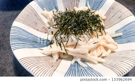 Shredded radish with mayonnaise 133962694