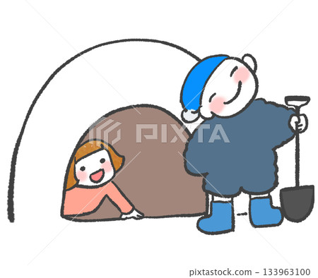 A boy proudly making a snow hut and a girl peeking out from inside 133963100