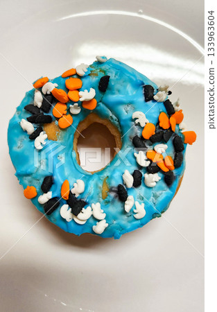 Three Colorful Donuts With Sprinkles  133963604