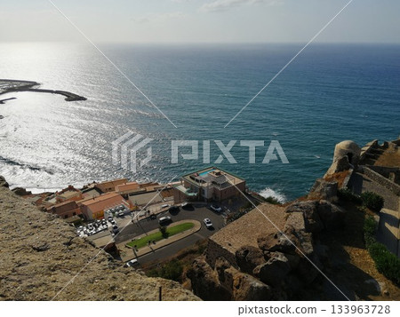 Sunset over Sea and Rocky Coast Sunset over Sea and Rocky Coast 133963728