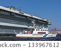 The Royal Navy aircraft carrier Queen Elizabeth calling at Tokyo Port and the Japan Coast Guard on guard 133967612