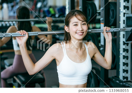 Young woman training in the gym 133968055