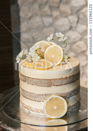 A large, luxurious cake with a sophisticated, adult feel. A large, luxurious cake with a sophisticated, adult feel. 133968120