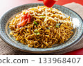 Cup Yakisoba Served on a Plate 133968407