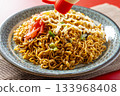 Cup Yakisoba Served on a Plate 133968408