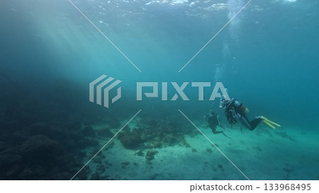 Blue sea and diver Blue sea and diver 133968495