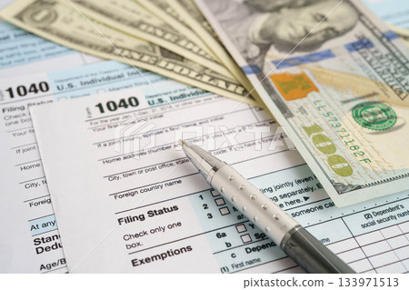 Tax form 1040 U.S. Individual Income Tax Return, business finance concept. Tax form 1040 U.S. Individual Income Tax Return, business finance concept. 133971513