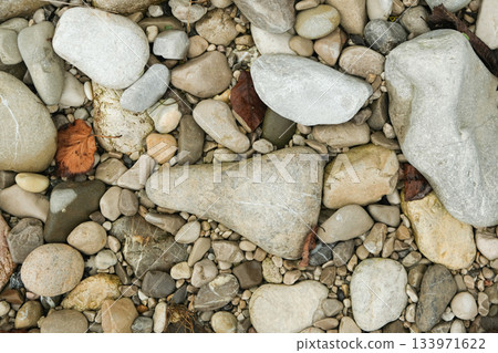 Varied Shades of Grey and Beige River Rocks 133971622