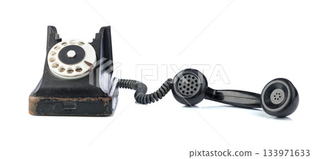 Vintage black phone isolated on a white background. 133971633