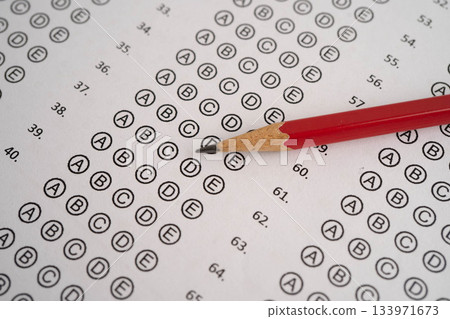 Answer sheets with pencil drawing fill to select choice, education. 133971673