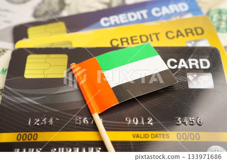 United Arab Emirates flag on credit card, finance economy trading shopping online business. United Arab Emirates flag on credit card, finance economy trading shopping online business. 133971686
