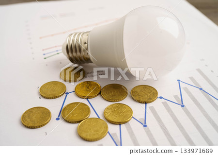 Cost of electric utilities with light bulb for payment. Cost of electric utilities with light bulb for payment. 133971689