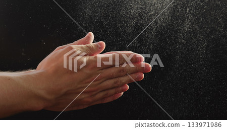 closeup man clapping hands with fine powder closeup man clapping hands with fine powder 133971986