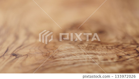 closeup of oil finished olive wood surface closeup of oil finished olive wood surface 133972026