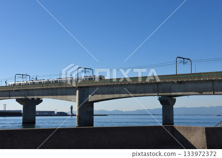Centrair railway bridge and Meitetsu train 133972372