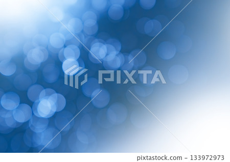 Blue bokeh background with transparent light spots Blue bokeh background with transparent light spots 133972973