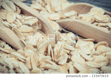 Healthy rye flakes or oat bran as source dietary fiber and minerals. Nutritious eating 133973619