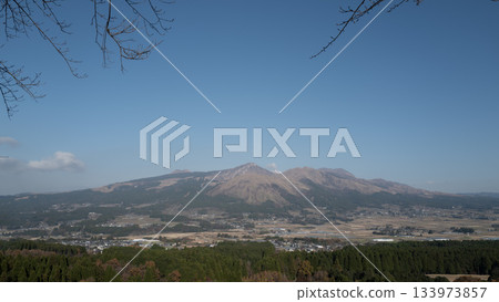 The view of Mount Aso emitting smoke from Men-no-Ishi Observation Point and Tori-no-Kozuka Park The view of Mount Aso emitting smoke from Men-no-Ishi Observation Point and Tori-no-Kozuka Park 133973857