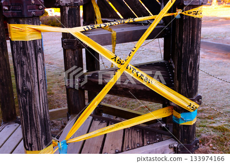 Playground equipment in a park that has been banned due to deterioration Playground equipment in a park that has been banned due to deterioration 133974166