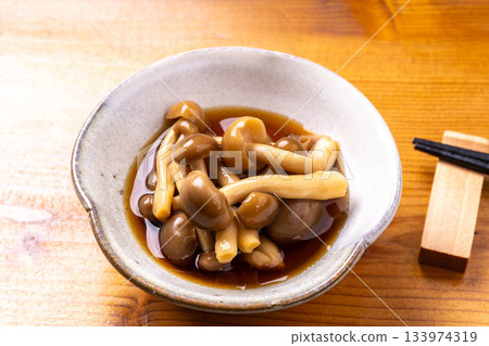 Shimeji mushrooms pickled in noodle soup Shimeji mushrooms pickled in noodle soup 133974319