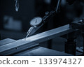 Close up scene the work alignment setup by dial indicator in the blue tone scene. 133974327