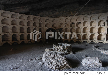 A rocky grotto with stone arches on the Golitsyn Trail in Novy Svet A rocky grotto with stone arches on the Golitsyn Trail in Novy Svet 133974534