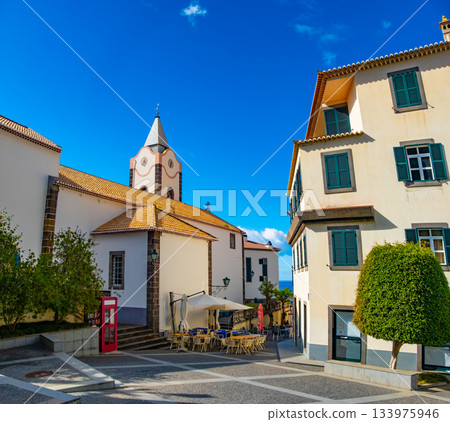 View of Ponta do Sol, a small touristic village in the city of Funchal, main avenue facing the sea, with residential buildings, Madeira Island, Portugal 133975946
